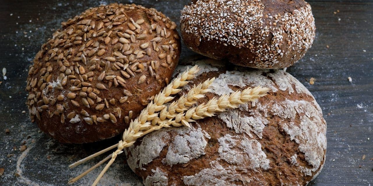 wheat breads with wheat stalks over it